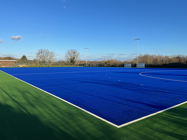 Water based field hockey field