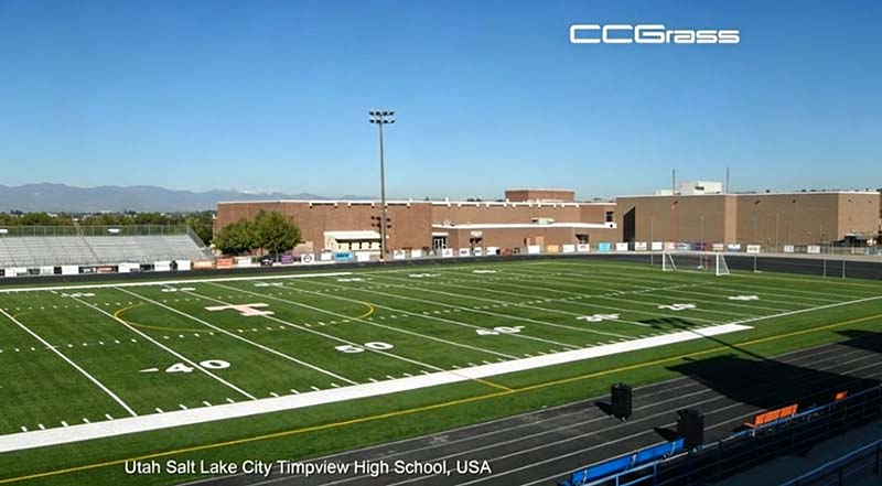 Multi-use sports field with soccer and football markings on the same surface