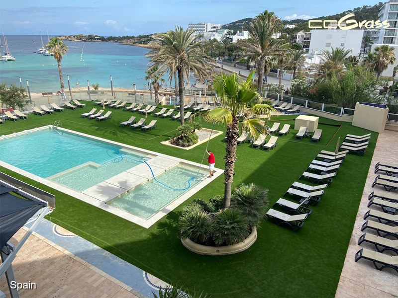 artificial grass around commercial pool area with high traffic