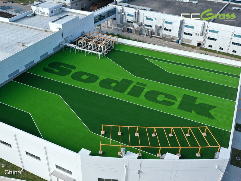 Corporate rooftop with branded artificial grass design for office outdoor space Corporate rooftop with branded artificial grass design for office outdoor space