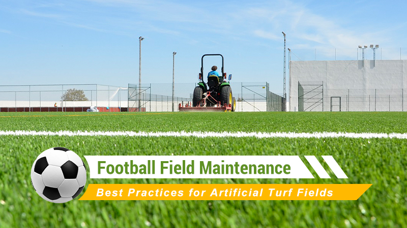 Artificial football field being groomed with a turf maintenance machine
